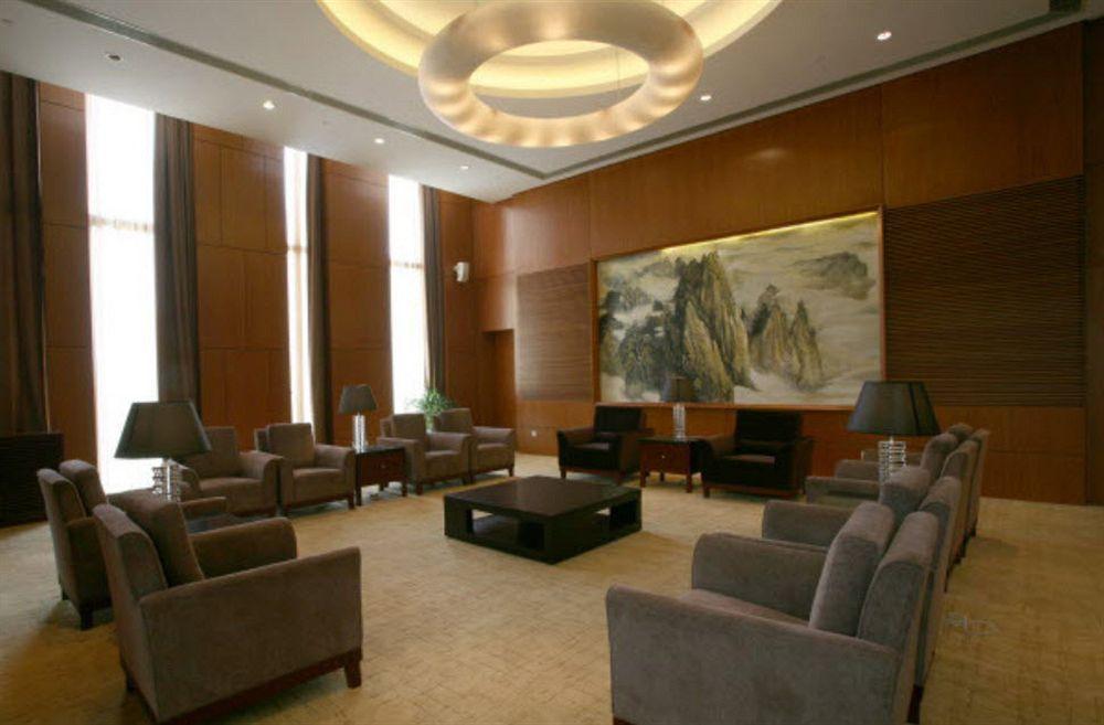 Howard Johnson Plaza Lingang Shanghai Хайнань Экстерьер фото